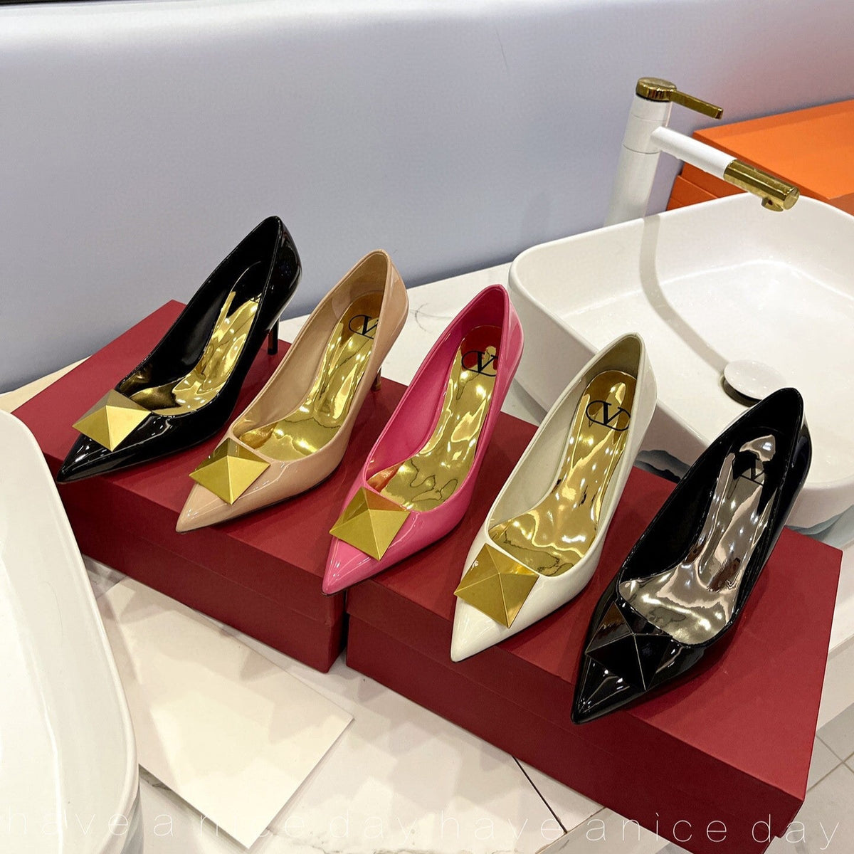 One Stud Black Patent Black Leather Pump