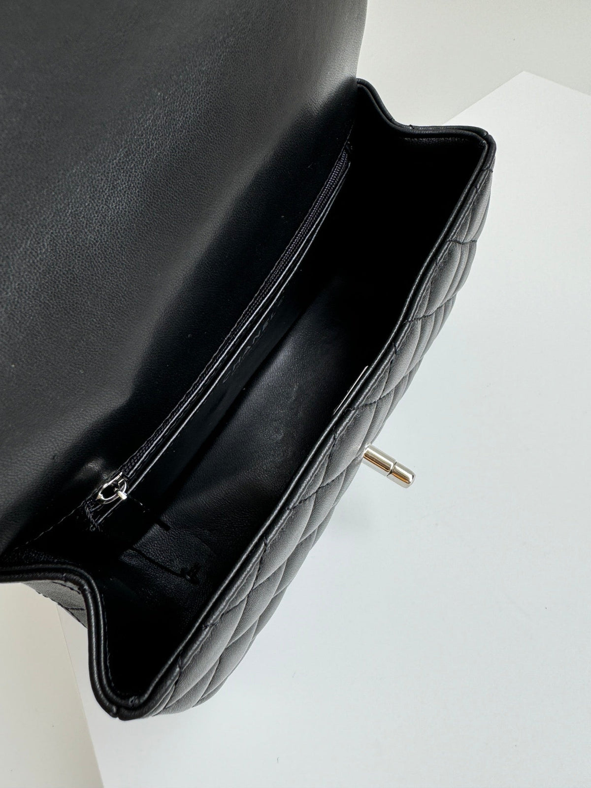 24c mini flap bag 20cm with top handle black calfskin silver hardware
