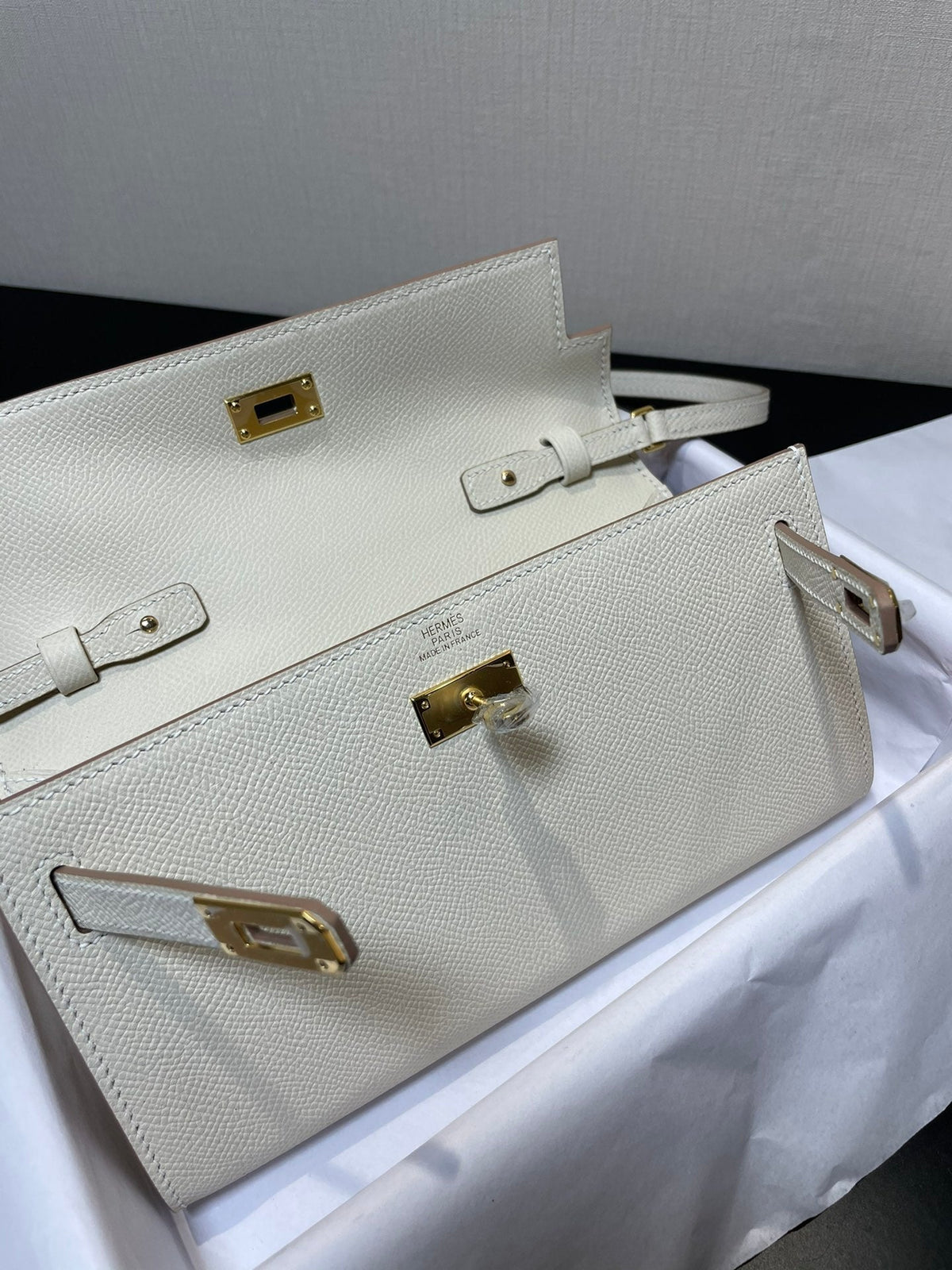 kelly woc 20.5 white epsom gold hardware