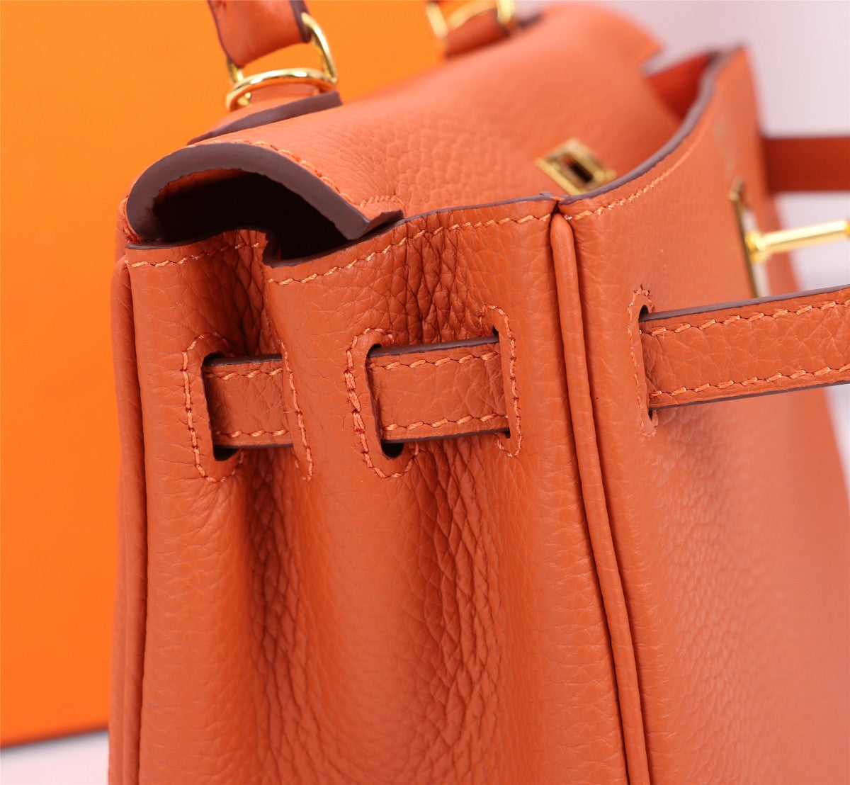 HM KELLY BAG 25 ORANGE TOGO GOLD HARDWARE