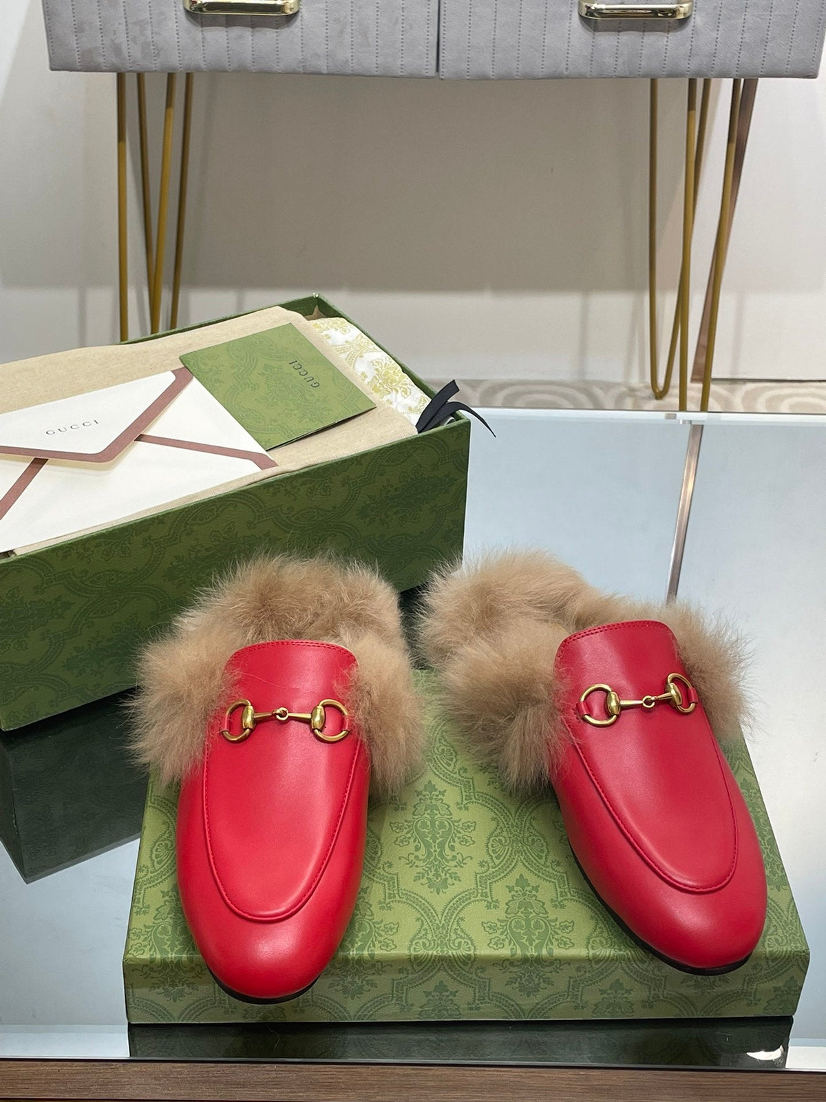 HORSEBIT MULE IN CHERRY RED CALFSKIN AND LAMB WOOL LINING