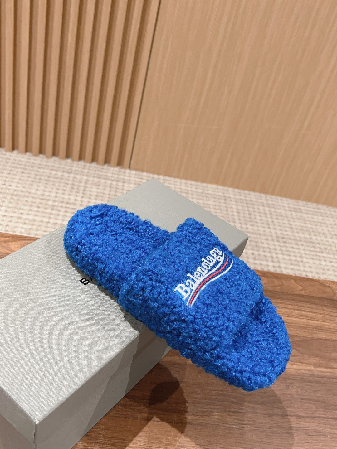 FURRY SLIDES IN COBALT BLUE CURLY SHEARLING