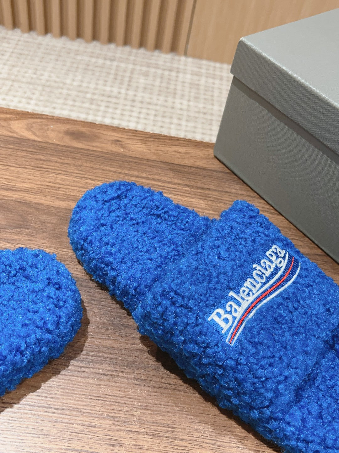 FURRY SLIDES IN COBALT BLUE CURLY SHEARLING