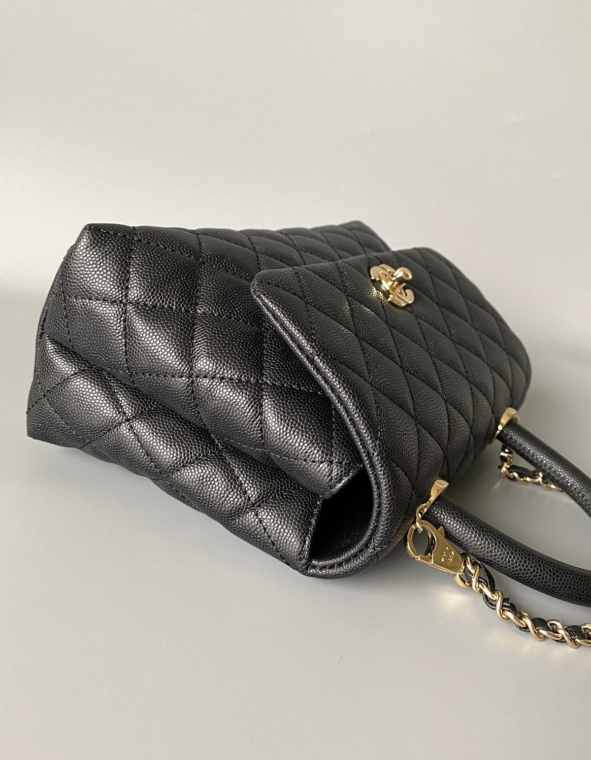 coco handle flap bag 23cm black quilted caviar light gold hardware
