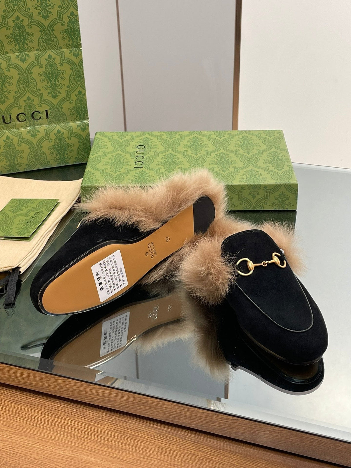HORSEBIT MULE IN BLACK SUEDE AND LAMB WOOL LINING