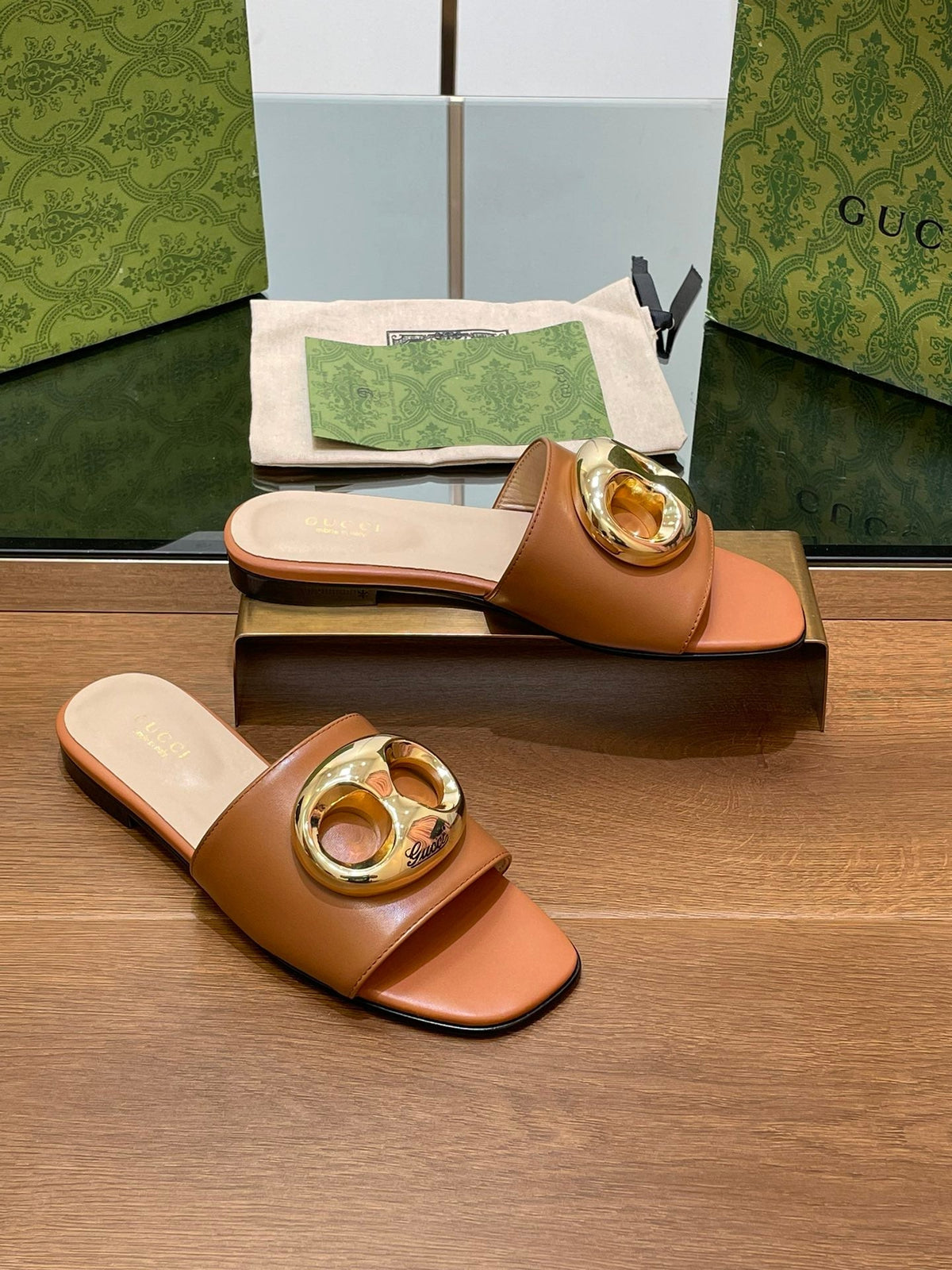 FLAT MULE IN BRONE BROWN CALFSKIN