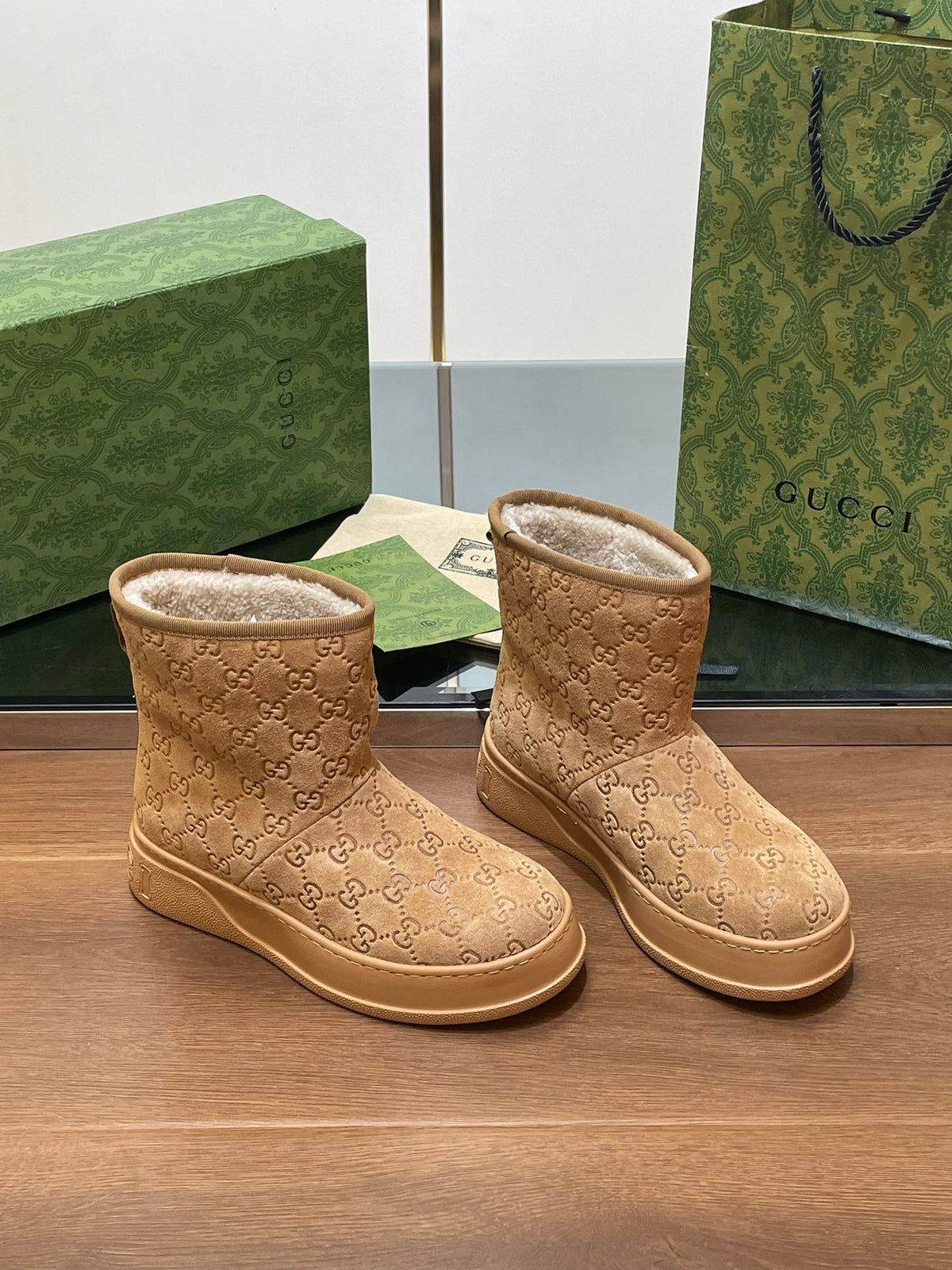 GG UGG BOOTS IN CIDER BROWN EMBOSSED SUEDE AND BEIGE WOOL LINING