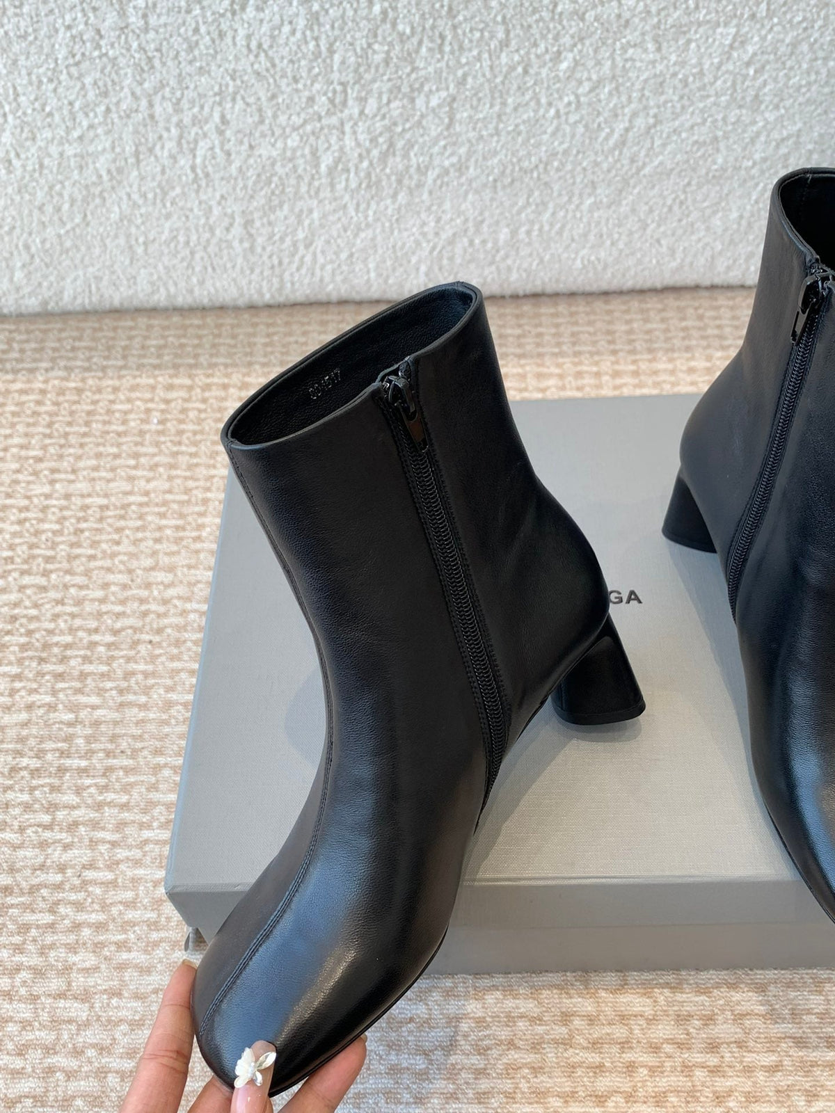 ANKLE BOOTS IN BLACK LOGO EMBOSSED SOFT SHEEPSKIN