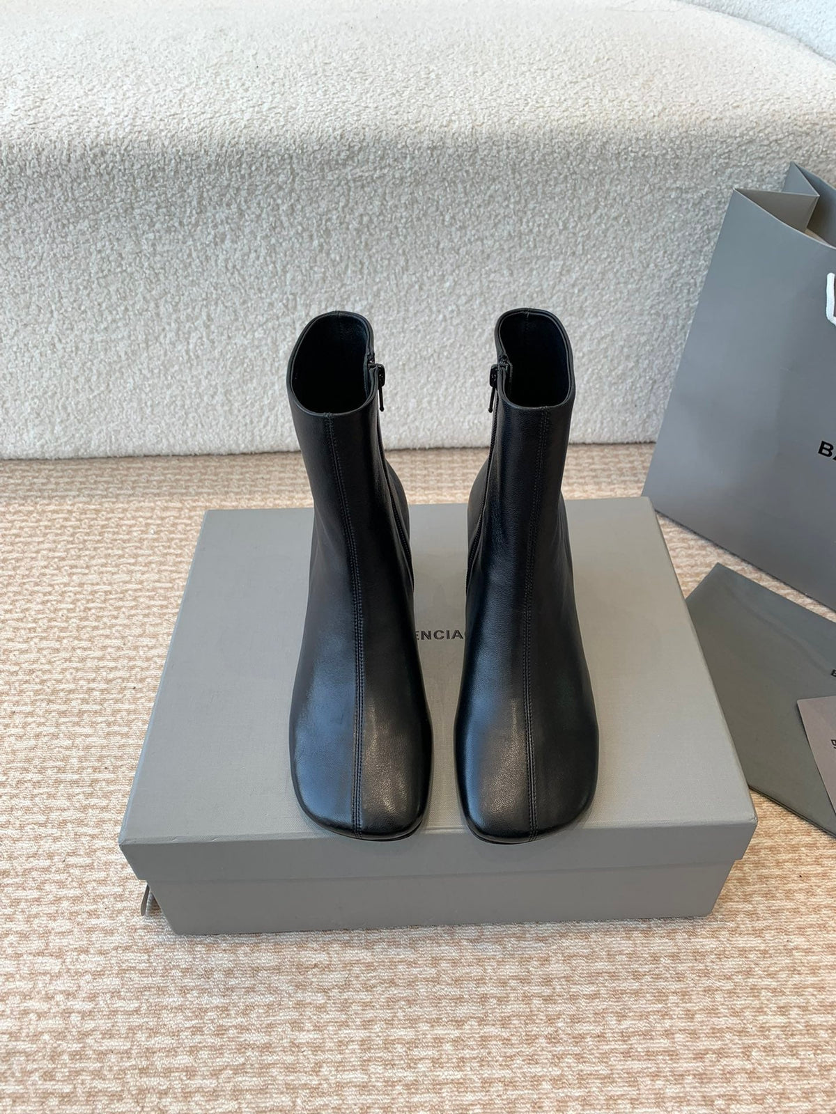 ANKLE BOOTS IN BLACK LOGO EMBOSSED SOFT SHEEPSKIN