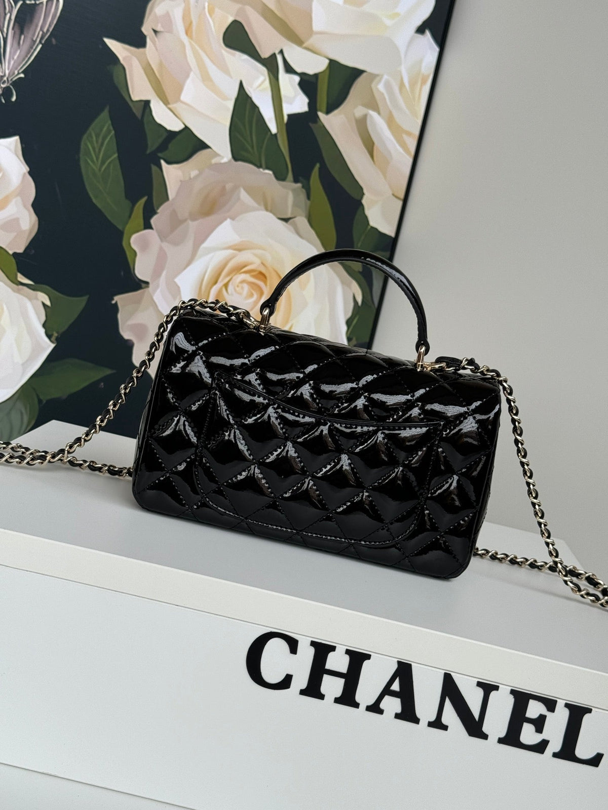 24c mini flap bag 20cm with top handle black patent calfskin
