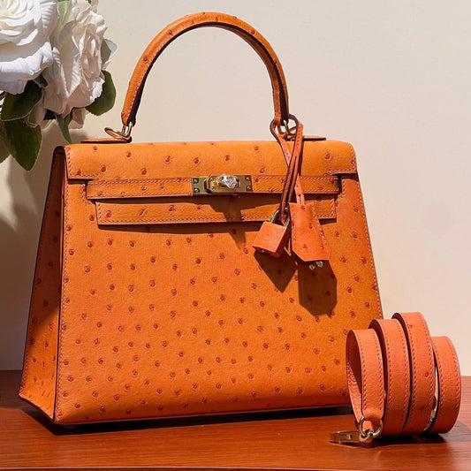 KELLY SELLIER 25 BAG IN FIRE ORANGE OSTRICH LEATHER WITH GOLD HARDWARE (MADE - TO - ODER)