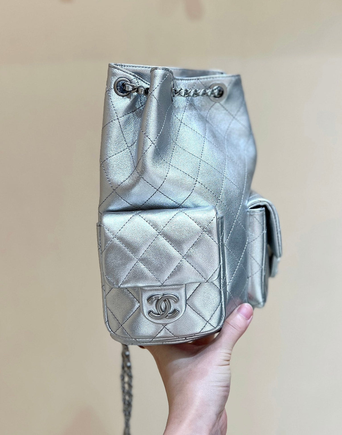 DRAWSTRING BUCKET BACKPACK 24 IN SILVER-TONE LAMBSKIN SILVER HARDWARE