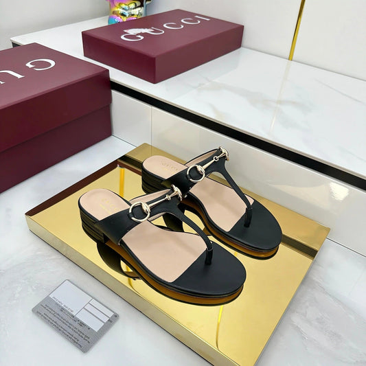 THONG SANDALS IN BLACK LAMBSKIN WITH GOLD HARDWARE