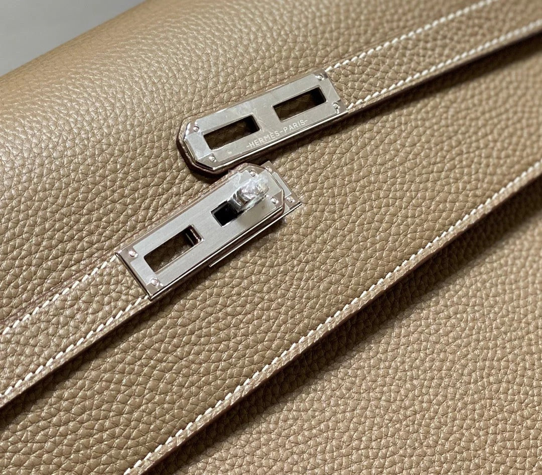KELLY DEPECHES 38 BRIEFCASE IN ETOUPE TOGO CALFSKIN SILVER HARDWARE