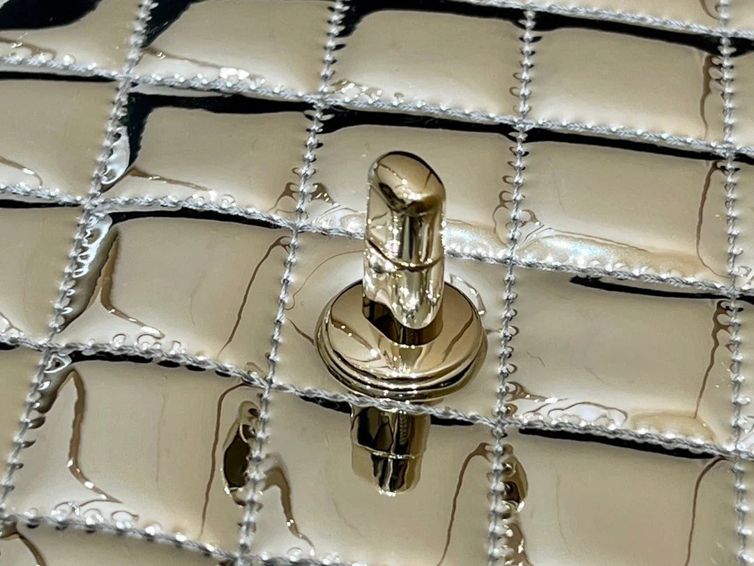 25S CHANEL STAR SILVER 23 IN METALLIC SILVER CALFSKIN