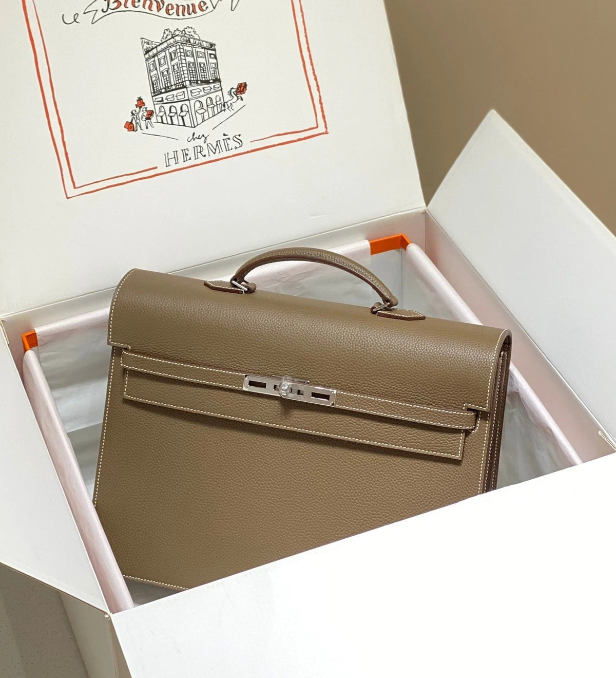 KELLY DEPECHES 38 BRIEFCASE IN ETOUPE TOGO CALFSKIN SILVER HARDWARE